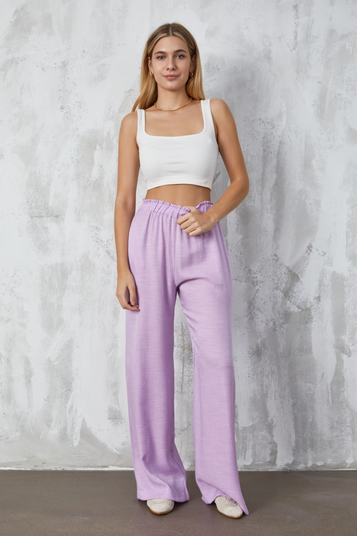 A wholesale clothing model wears fan10309-lilac-crinkle-glitter-loose-cut-trousers, Turkish wholesale Pants of First Angels