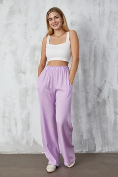A wholesale clothing model wears fan10309-lilac-crinkle-glitter-loose-cut-trousers, Turkish wholesale Pants of First Angels