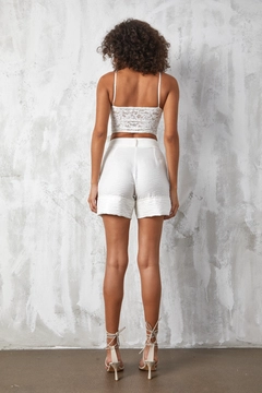 A wholesale clothing model wears fan10486-white-shiny-fabric-shorts, Turkish wholesale Shorts of First Angels