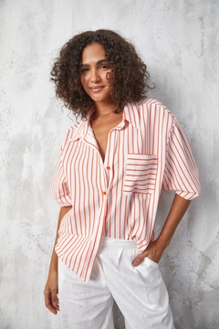 A wholesale clothing model wears fan10492-orange-stripe-printed-oversize-pocket-shirt, Turkish wholesale Shirt of First Angels