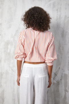A wholesale clothing model wears fan10492-orange-stripe-printed-oversize-pocket-shirt, Turkish wholesale Shirt of First Angels