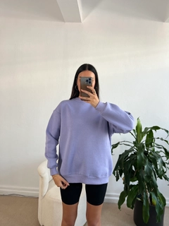 A wholesale clothing model wears fan10041-lilac-basic-oversize-sweatshirt, Turkish wholesale Sweatshirt of First Angels