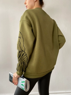 A wholesale clothing model wears fan10087-green-printed-oversize-sweatshirt, Turkish wholesale Sweatshirt of First Angels