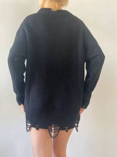 A wholesale clothing model wears fan10159-black-long-ripped-oversize-knitwear-sweater, Turkish wholesale Sweater of First Angels