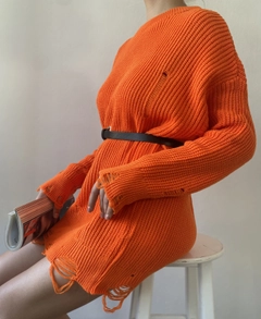 A wholesale clothing model wears fan10161-orange-long-ripped-oversize-knitwear-sweater, Turkish wholesale Sweater of First Angels