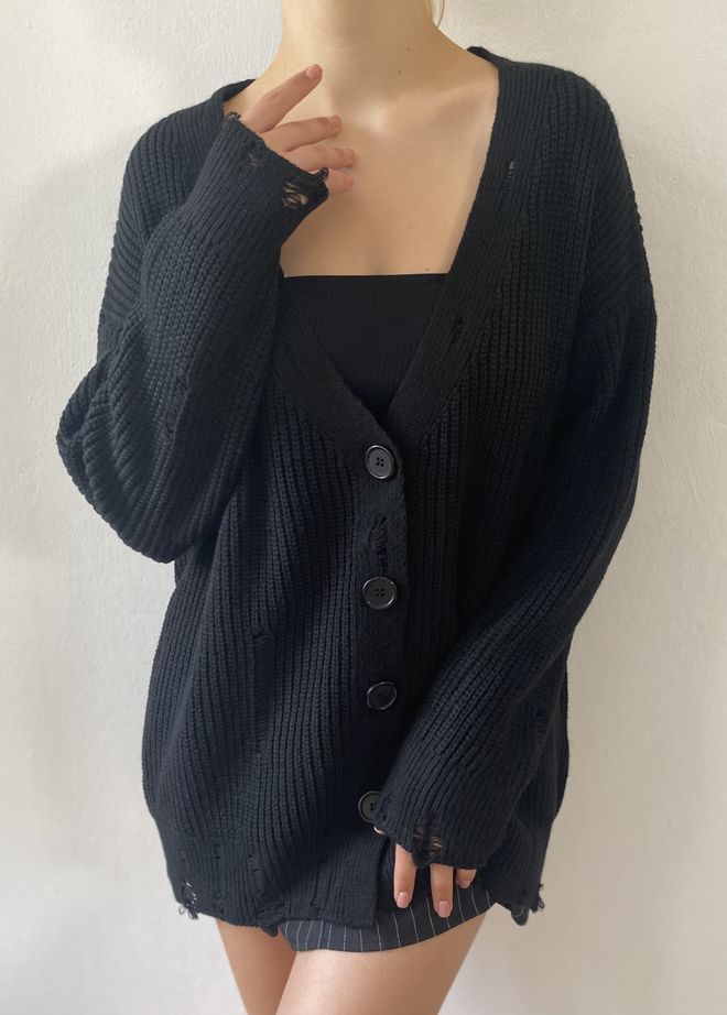 First Angels Cardigan nero con dettagli strappati Abbigliamento all'ingrosso Casuale