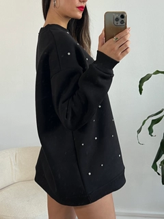 A wholesale clothing model wears fan10217-black-stone-embroidered-oversize-sweatshirt, Turkish wholesale Sweatshirt of First Angels