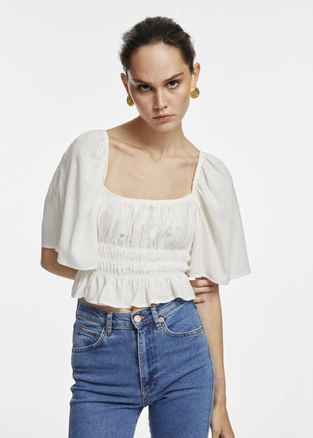 A model wears 17286 - Ruffle Detail Linen Blouse - White, wholesale Blouse of Fk.Pynappel to display at Lonca
