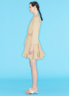 Ein Bekleidungsmodell aus dem Großhandel trägt 10182 - Dress With Skirt Godet - Beige, türkischer Großhandel Kleid von Fk.Pynappel