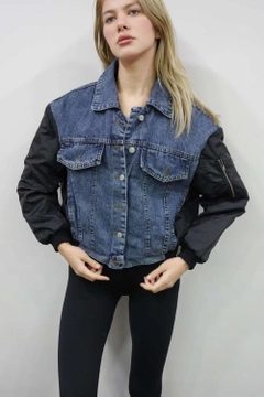 A wholesale clothing model wears flw10056-denim-jacket-with-parachute-garnish-blue, Turkish wholesale Denim Jacket of Flow