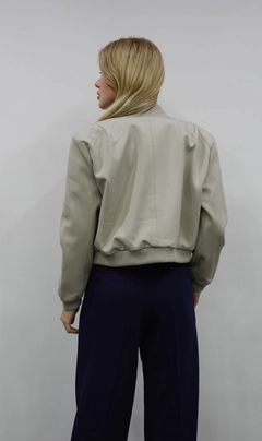 A wholesale clothing model wears flw10065-padded-bomber-jacket-beige, Turkish wholesale Jacket of Flow