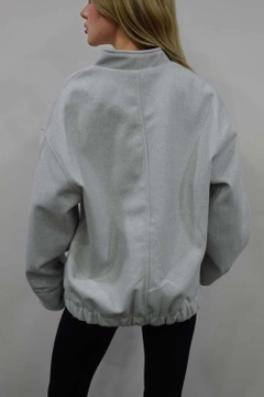 A wholesale clothing model wears flw10073-bomber-stamp-jacket-gray, Turkish wholesale Jacket of Flow