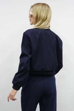 A wholesale clothing model wears flw10083-padded-bomber-jacket-navy-blue, Turkish wholesale Jacket of Flow