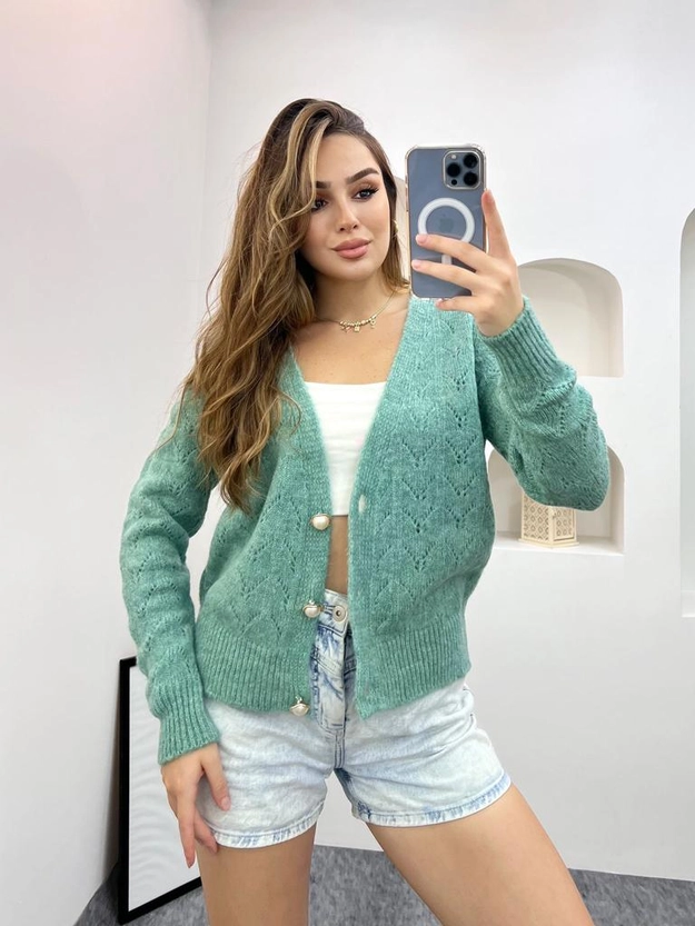 A model wears 28064 - Cardigan - Mint Green, wholesale Cardigan of Helios to display at Lonca