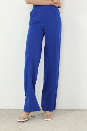 A model wears HAV10019 - Retro Palazzo Trousers - Saks, wholesale Pants of Helin Avşar to display at Lonca