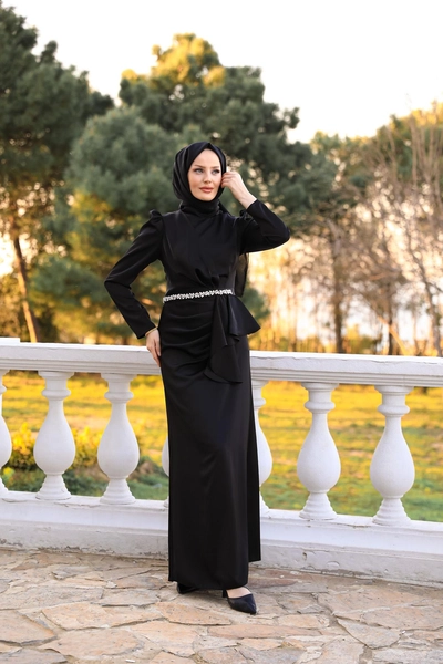 A model wears HUL10045 - Ebru Satin Evening Dress - Black, wholesale Dress of Hulya Keser to display at Lonca