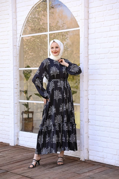 A model wears HUL10065 - Turquoise Dress - Black, wholesale Dress of Hulya Keser to display at Lonca