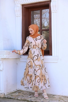 A wholesale clothing model wears HUL10102 - Helen Chain Dress - Mink, Turkish wholesale Dress of Hulya Keser