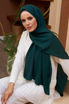 A wholesale clothing model wears hul10630-medina-silk-shawl-emerald-green, Turkish wholesale Shawl of Hulya Keser