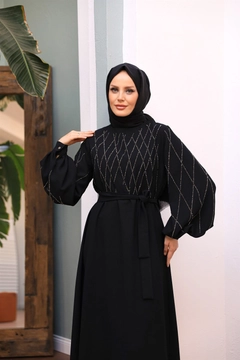 Ein Bekleidungsmodell aus dem Großhandel trägt 47352 - Evening Dress - Black, türkischer Großhandel Kleid von Hulya Keser