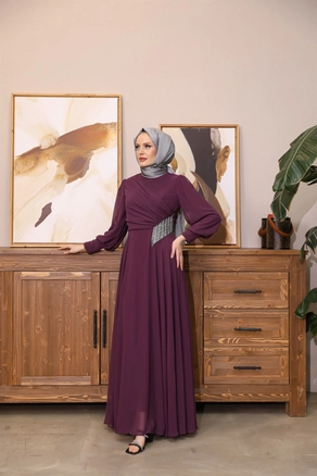 A model wears 47373 - Evening Dress - Plum, wholesale Dress of Hulya Keser to display at Lonca