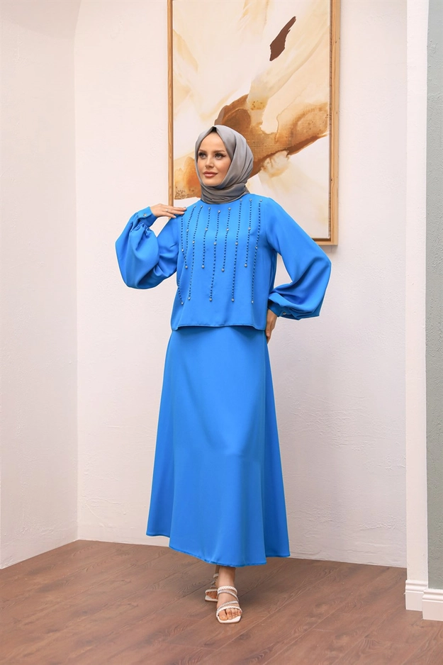 A model wears 47726 - Suit - Blue, wholesale Suit of Hulya Keser to display at Lonca