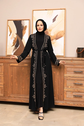 A model wears 37642 - Abaya - Black, wholesale undefined of Hulya Keser to display at Lonca