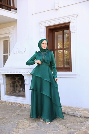 A model wears 37680 - Evening Dress - Emerald, wholesale Dress of Hulya Keser to display at Lonca