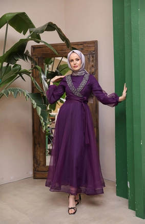 A model wears 37683 - Evening Dress - Purple, wholesale Dress of Hulya Keser to display at Lonca