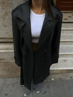A wholesale clothing model wears ili10009-epaulette-belted-leather-long-jacket-black, Turkish wholesale Jacket of Ilia