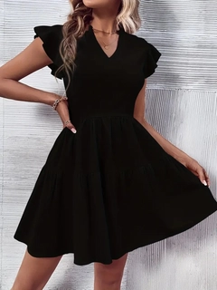 A wholesale clothing model wears jan13816-women's-short-sleeve-sleeve-ruffle-aerobin-mini-dress-black, Turkish wholesale Dress of Janes