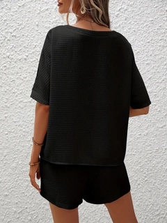 A wholesale clothing model wears jan13846-women's-short-sleeve-crew-neck-casual-waffle-blouse-shorts-set-black, Turkish wholesale Blouse of Janes
