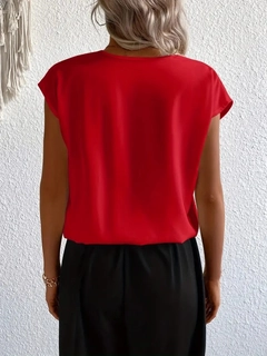 A wholesale clothing model wears jan13862-women's-short-sleeve-double-breasted-neck-local-crepe-blouse-red, Turkish wholesale Blouse of Janes