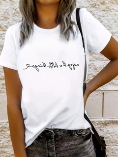 A wholesale clothing model wears jan13870-women's-short-sleeve-basic-viscose-with-text-printed-on-the-front-white, Turkish wholesale Tshirt of Janes