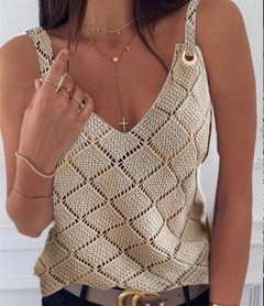 A wholesale clothing model wears jan14119-women's-sleeveless-ring-detail-diamond-pattern-strappy-knitwear-blouse-beige, Turkish wholesale Blouse of Janes