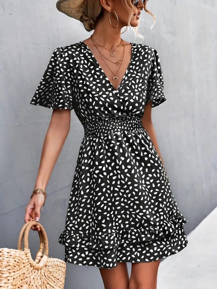 A wholesale clothing model wears jan14271-women's-short-sleeve-double-breasted-neck-waist-glitter-skirt-flounced-white-polka-dot-sandy-dress-black, Turkish wholesale Dress of Janes