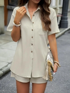 A wholesale clothing model wears jan14471-women's-short-sleeve-aerobin-shirt-and-shorts-set-beige, Turkish wholesale Suit of Janes