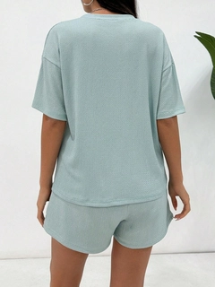 A wholesale clothing model wears jan14491-women's-light-gray-gimped-suprem-and-lined-shorts-set-gray, Turkish wholesale Suit of Janes