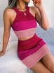 A wholesale clothing model wears jan14554-women's-sleeveless-halter-neck-crop-and-mini-skirt-double-knitwear-set-pink, Turkish wholesale  of 