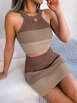 A wholesale clothing model wears jan14556-women's-sleeveless-halter-neck-crop-and-mini-skirt-double-knitwear-set-brown, Turkish wholesale  of 
