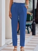 Bir model,  toptan giyim markasının jan14581-women's-elastic-waist-linen-trousers-blue toptan  ürününü sergiliyor.