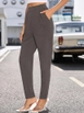 Una modelo de ropa al por mayor lleva jan14604-women's-high-waist-imported-crepe-pants-with-pockets-gray,  turco al por mayor de 