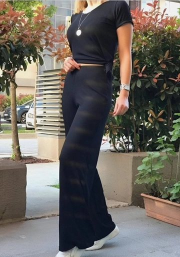 A wholesale clothing model wears  Women's Short Sleeve Wide Leg Camisole Double Suit - Black
, Turkish wholesale Suit of Janes