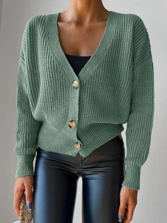A wholesale clothing model wears jan11970-women's-long-sleeve-button-detail-knitwear-blouse-green, Turkish wholesale Cardigan of Janes