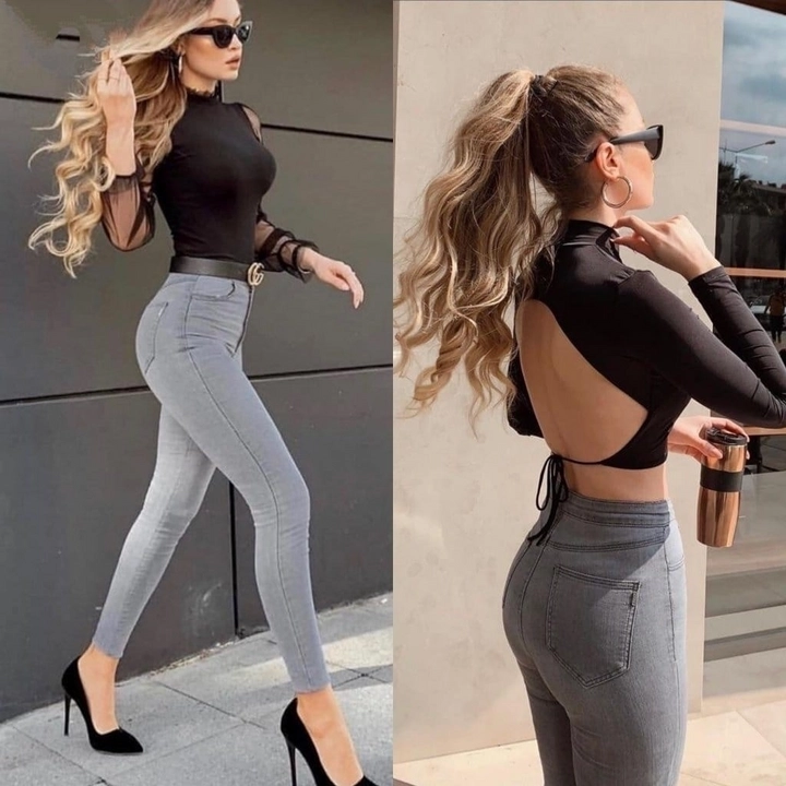 Bir model, Janes toptan giyim markasının jan13152-lycra-high-waist-jean-trousers-gray toptan Kot Pantolon ürününü sergiliyor.