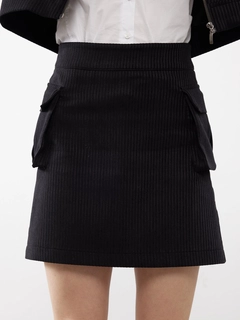A wholesale clothing model wears jst10293-velvet-pocket-detail-mini-skirt-black, Turkish wholesale Skirt of Juste