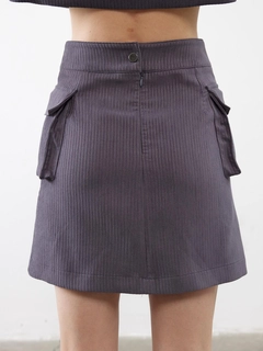 A wholesale clothing model wears jst10298-velvet-pocket-detail-mini-skirt-anthracite, Turkish wholesale Skirt of Juste