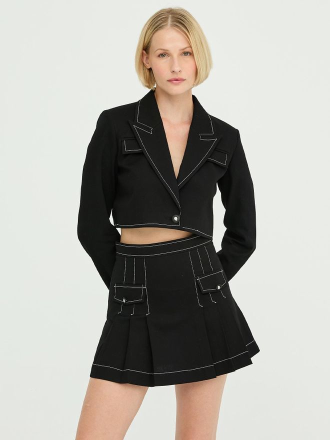 Juste Minigonna A Pieghe Con Cuciture Dettagliate In Gabardine Nera Abbigliamento all'ingrosso Casuale