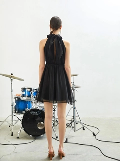 A wholesale clothing model wears jst10190-organza-black-mini-evening-dress, Turkish wholesale Dress of Juste