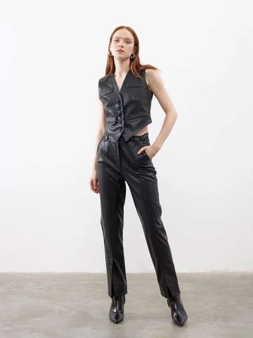 A wholesale clothing model wears  Black Slit Detail Leather Trousers
, Turkish wholesale  of Juste